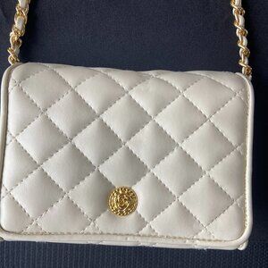 Ivory quilted faux leather evening bag with chain